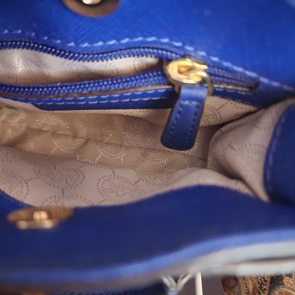 Michael Kors Mini Blue Handbag with Gold Accents - Picture 5 of 7